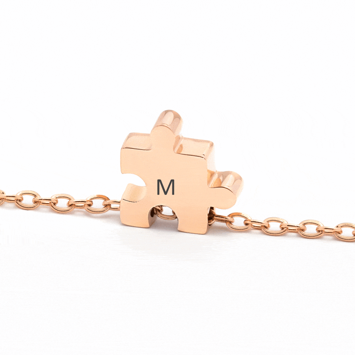 https://m.clubbella.co/product/duna-rose-gold-puzzle-charm-bracelet/ duna-puzzle-rose-gold-engraved